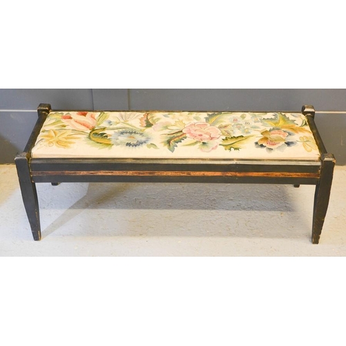 616 - An antique long stool with crewel work upholstered seat.