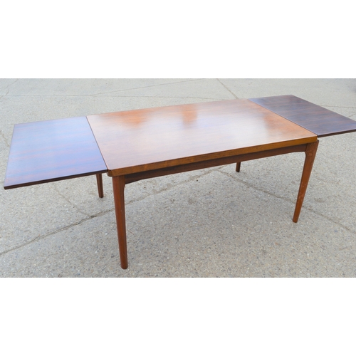 109a - A Mid-Century Vejle Moebelfabrik extending dining table, 240cm by 88cm by 73cm high