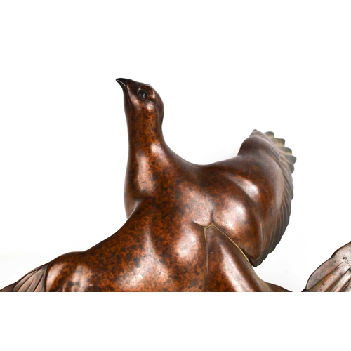 116 - Simon Gudgeon (20th century): limited edition bronze sculpture, flying grouse, with a mottled bronze... 