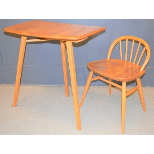 591 - An Ercol elm table extender together with an Ercol style child's chair.