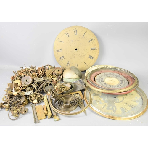 104 - A group of clock parts to include an early 19th century brass clock face signed Edw Butler of Tutbur... 