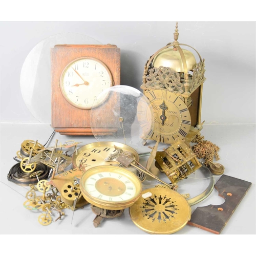 117 - A group of clock parts and clocks to include a Bulle electric clock, a reproduction lantern clock, v... 