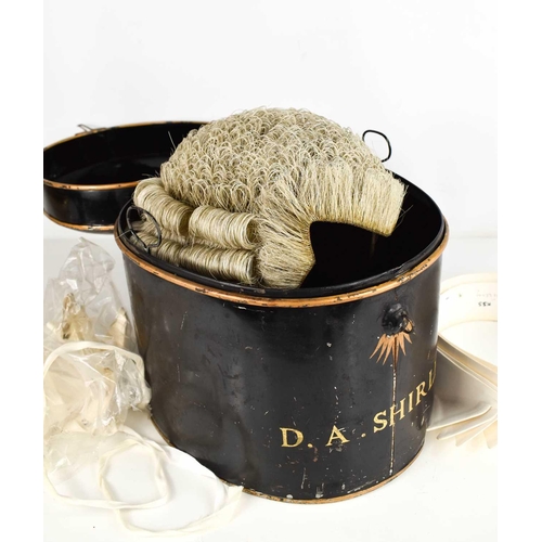 142 - An antique barristers wig and original display tin, by Ravenscroft Law, Wig & Robe Makers, Lincolns ... 