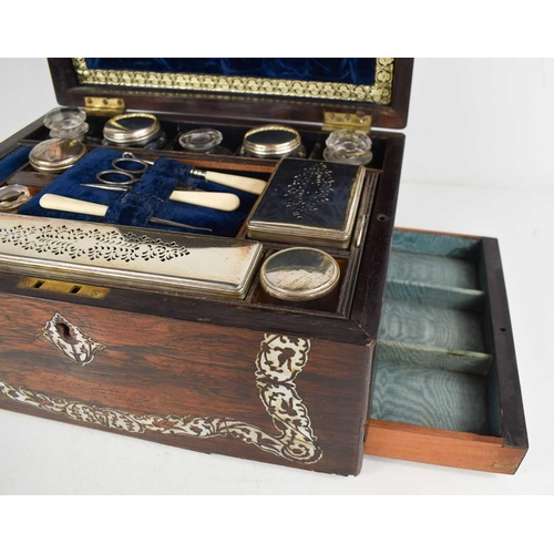 151 - A 19th century rosewood and mother of pearl vanity case, the blue velvet lined and fitted interior h... 