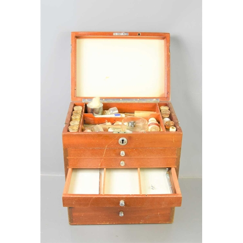 203 - A mid 20th century oak portable dentist cabinet with six graduating drawers each with glass bottom, ... 