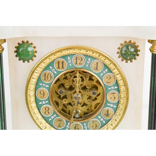 23 - A French alabaster and gilt metal mantle clock, surmounted by a lion, the green/blue Arabic dial bor... 