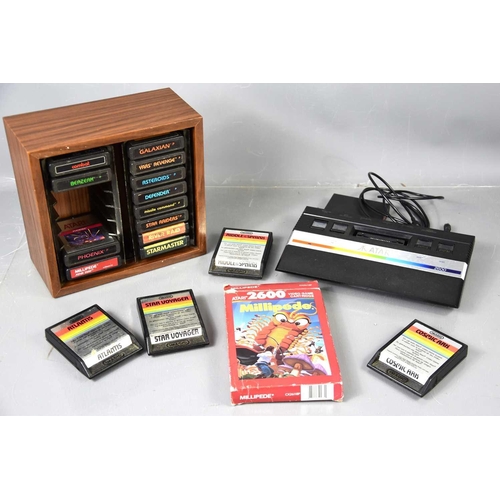 343 - A vintage Atari 2600 games console and a quantity of games to include Star Voyager, Phoenix, Starmas... 