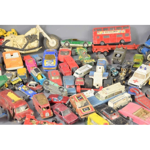 345 - A large group of Dinky, Corgi, Lesney and other diecast and plastic cars and vehicles.