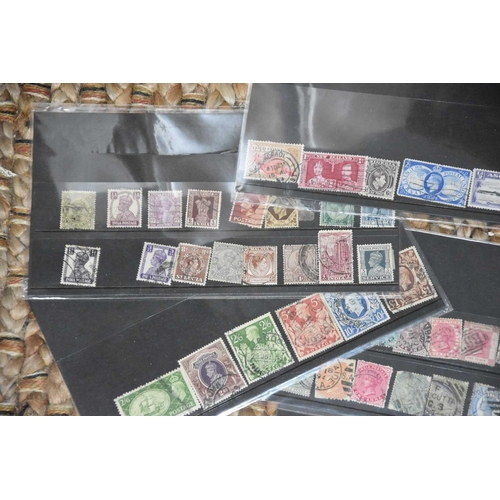 383 - Three albums of Royal Mail postcards, together with four empty Stanley Gibbons stamp albums and a sm... 