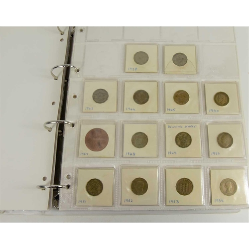 390 - An album of GB coins to include silver shillings, sixpences, half crowns, farthings and others.