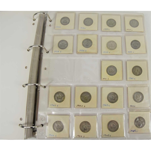 390 - An album of GB coins to include silver shillings, sixpences, half crowns, farthings and others.