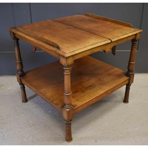 475 - A 19th century mahogany book rest / table, the folding top having two removable book rest slides, ra... 