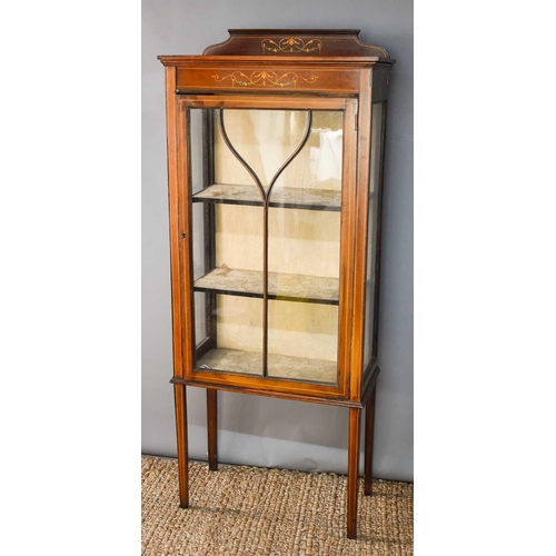 497 - An Edwardian mahogany display cabinet with glazed single door and sides, decorated with boxwood stri... 