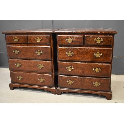 500 - A pair of 18th century style oak chests / bedside cabinets, of small proportions, with two short ove... 