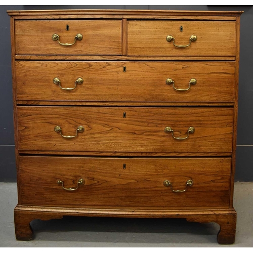 504 - A Georgian elm chest of drawers, the two short over three long drawers raised above bracket feet, 98... 