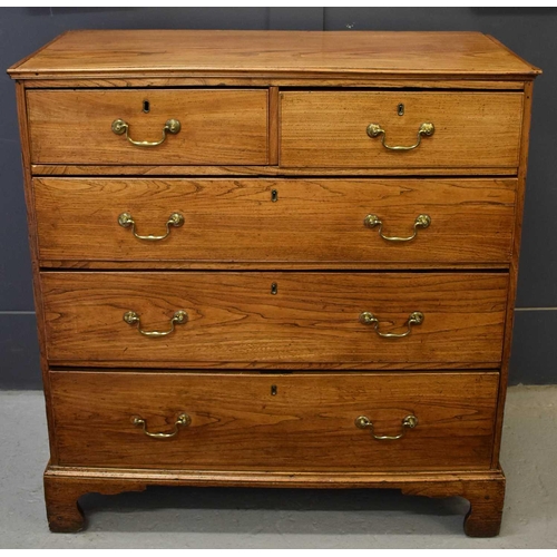 504 - A Georgian elm chest of drawers, the two short over three long drawers raised above bracket feet, 98... 