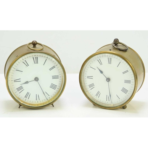 52 - Two 19th/early 20th century brass cased campaign/travel drum clocks the circular enamel dial set wit... 