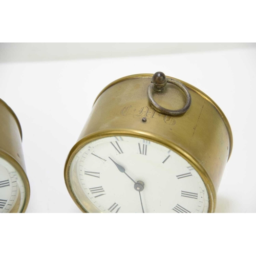 52 - Two 19th/early 20th century brass cased campaign/travel drum clocks the circular enamel dial set wit... 