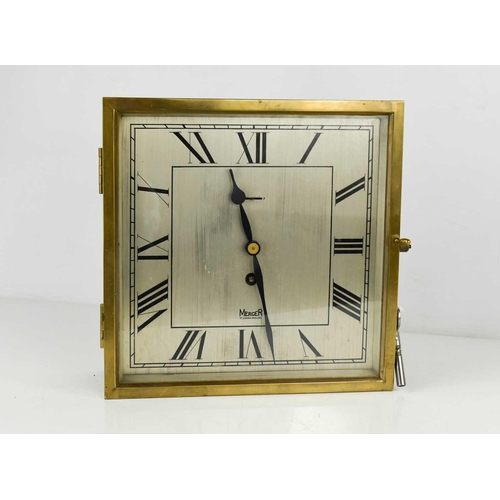 54 - An Art Deco period Mercer wall clock, of square form, the wooden case with brass glazed door enclosi... 