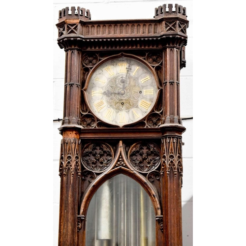 72 - An impressive Gothic revival Victorian clock, the silvered circular dial having gilt brass Gothic Ro... 