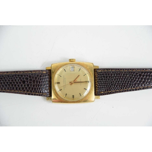 89 - A vintage Girard-Perregaux gyromatic gents wristwatch with a gold plated case and brown leather stra... 