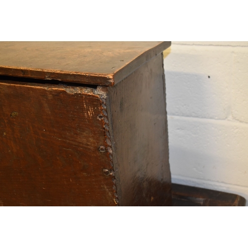 494 - A 17th century boarded oak coffer, with V cut end boards, chip carved corners, candlebox interior, a... 