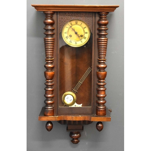 127 - An early 20th century mahogany Vienna style wall clock, Roman numeral dial.