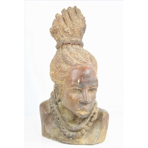 133 - An African carved soapstone bust of a native women with braided hair, signed P.Mosh, 33.5cm high.