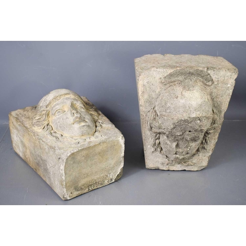 135 - A pair of Coade Stone arch keystones by William Croggon, Lambeth, dated 1823, each modelled with a m... 