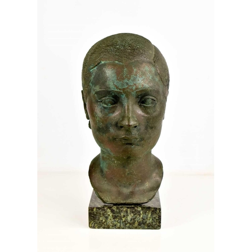 138 - A contemporary bronze sculpture of a female head, raised on a marble plinth, of green and brown pati... 