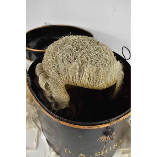 142 - An antique barristers wig and original display tin, by Ravenscroft Law, Wig & Robe Makers, Lincolns ... 