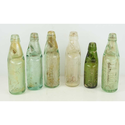 172 - A quantity of local interest excavated named bottles to include Peterborough examples.