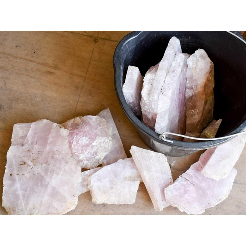 176 - A selection of rose quartz in various shaped sections.