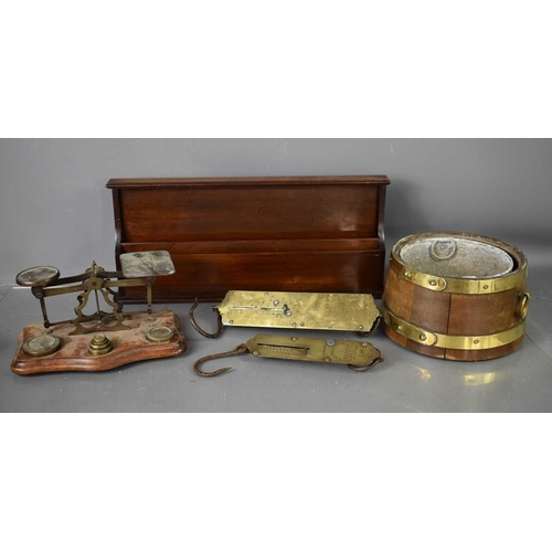 192 - A Victorian mahogany letter rack, wooden and brass jardiniere, two antique brass hanging scales, and... 