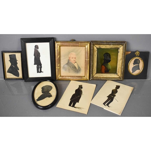 193 - A selection of Victorian silhouettes, together with a verre eglomise portrait of a lady, and a penci... 