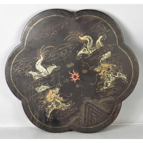 195 - A 19th century Chinese quatrefoil top occasional table depicting dragons, a/f.