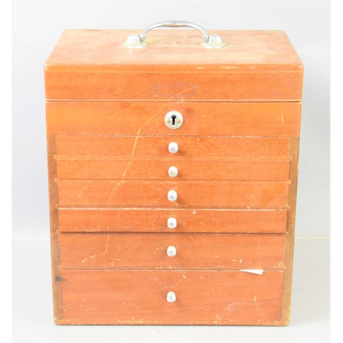 203 - A mid 20th century oak portable dentist cabinet with six graduating drawers each with glass bottom, ... 