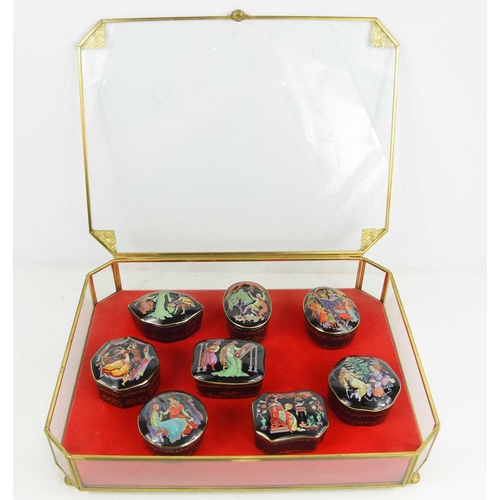 204 - A collection of eight Franklin Mint porcelain musical boxes depicting Russian ballet inside a glass ... 