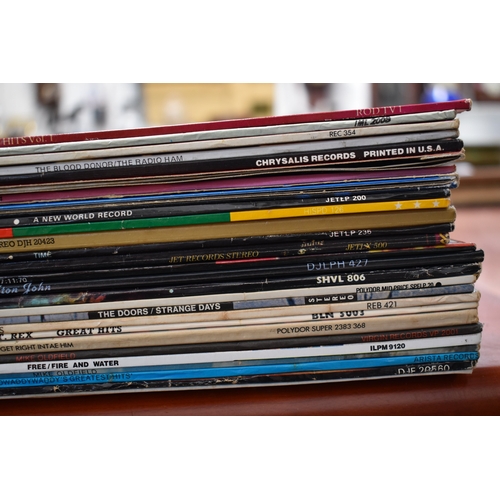 367 - A large group of vinyl LP records to include The Doors, Elton John, The Police, Velvet Underground, ... 