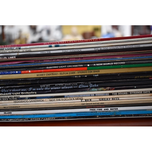 367 - A large group of vinyl LP records to include The Doors, Elton John, The Police, Velvet Underground, ... 