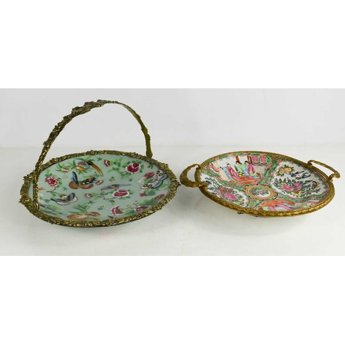 274 - A Chinese canton dish in a brass basket form frame, together with a famille rose dish in metal frame... 