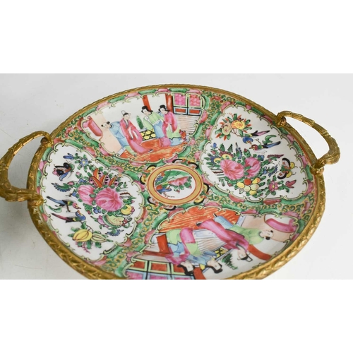 274 - A Chinese canton dish in a brass basket form frame, together with a famille rose dish in metal frame... 