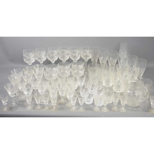 307 - A large group of mainly Stuart crystal drinking glasses of various sizes and styles.