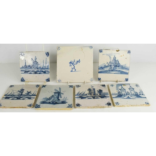 310 - A group of 18th century and later Delft times, each depicting Dutch landscapes, windmills and a figu... 