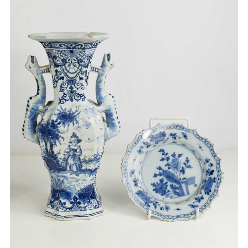 311 - A 19th century Delft twin handled blue and white vase, together with a blue and white Chinese dish w... 