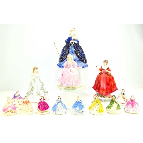 312 - A group of Coalport and Royal Worcester porcelain figurines to include Millennium Ball collection 