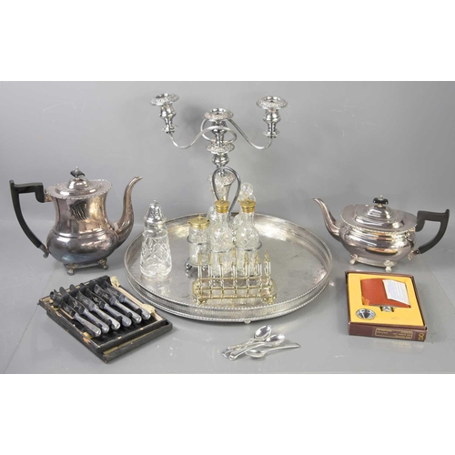 314 - A group of silver plate and other items to include a large gallery tray, tea pot, candelabra, cruet ... 