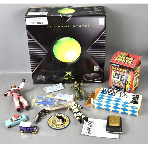 327 - A boxed original X-Box games console together with a Star Trek toy communicator, a vintage Radica ba... 