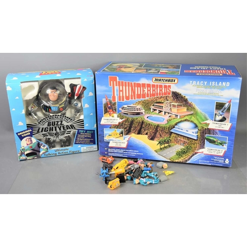 338 - A Vintage Matchbox Thunderbirds Tracey Island with accessories and original box together with a Disn... 