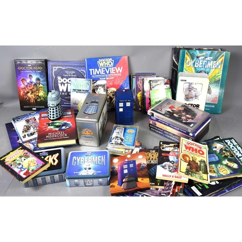 344 - A large group of Doctor Who memorabilia to include various books, limited edition Cybermen tin box s... 